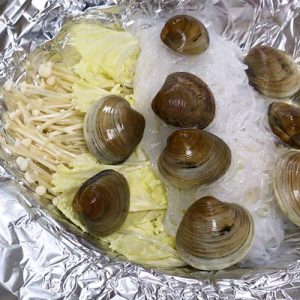 place the clam in the foil packet