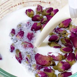 adding rose buds to the milk and cream